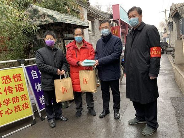 民建市委机关干部下沉社区一线参与疫情防控