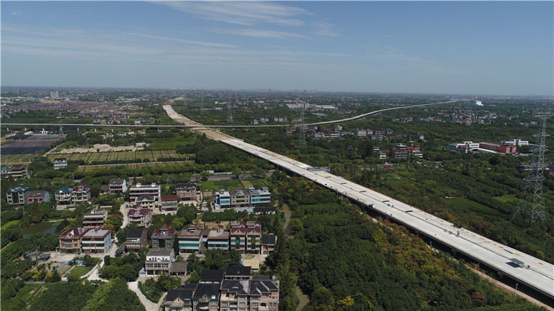 钱江通道北接线项目主线沥青路面全幅贯通 钱江通道北接线项目主线沥青路面全幅贯通