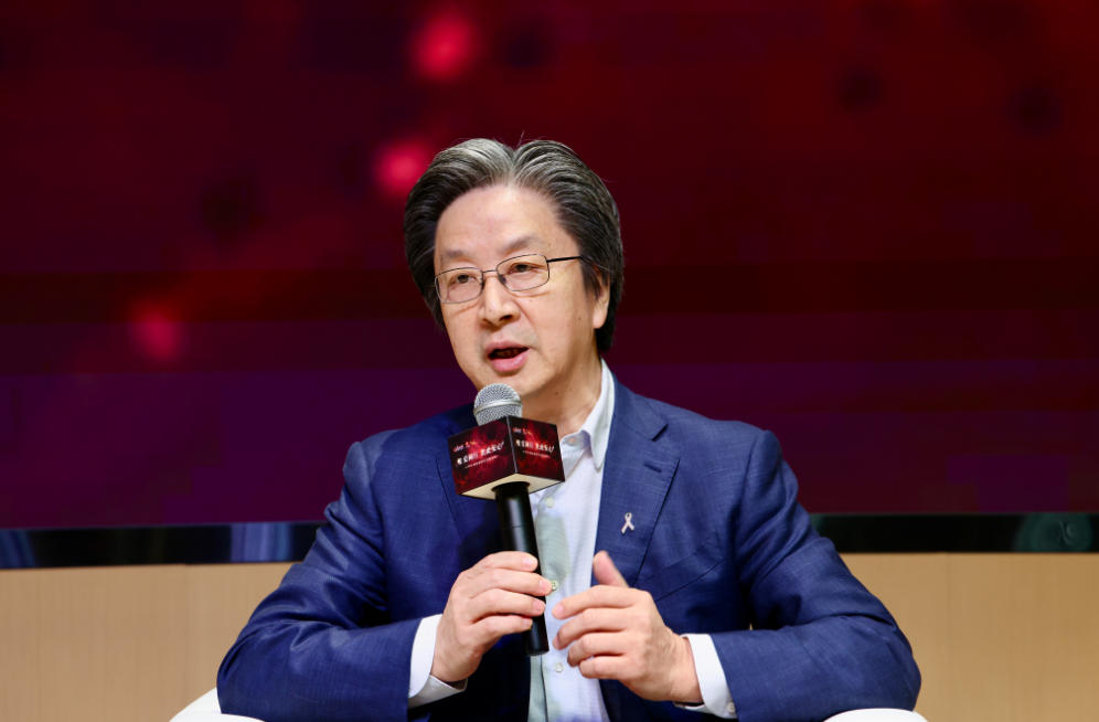 江泽飞:把“粉红丝带”挂胸上 把患者放心里 _光明网